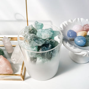 green quartz crystal raw stone in frosted glass home decor australia