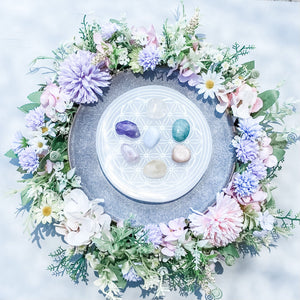 These beautiful Selenite Charging Plates with a flower of life pattern are perfect to use for charging your crystals. Placing your crystals on the charging plate will cleanse and recharge them of their existing energy. These can also be used for Crystal Grid Work.